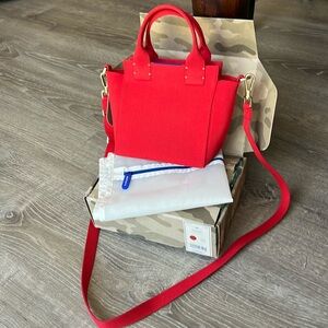 Rothy’s mini handbag in Candy Apple